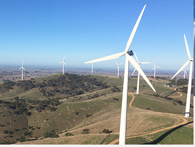 Wind turbines across hills